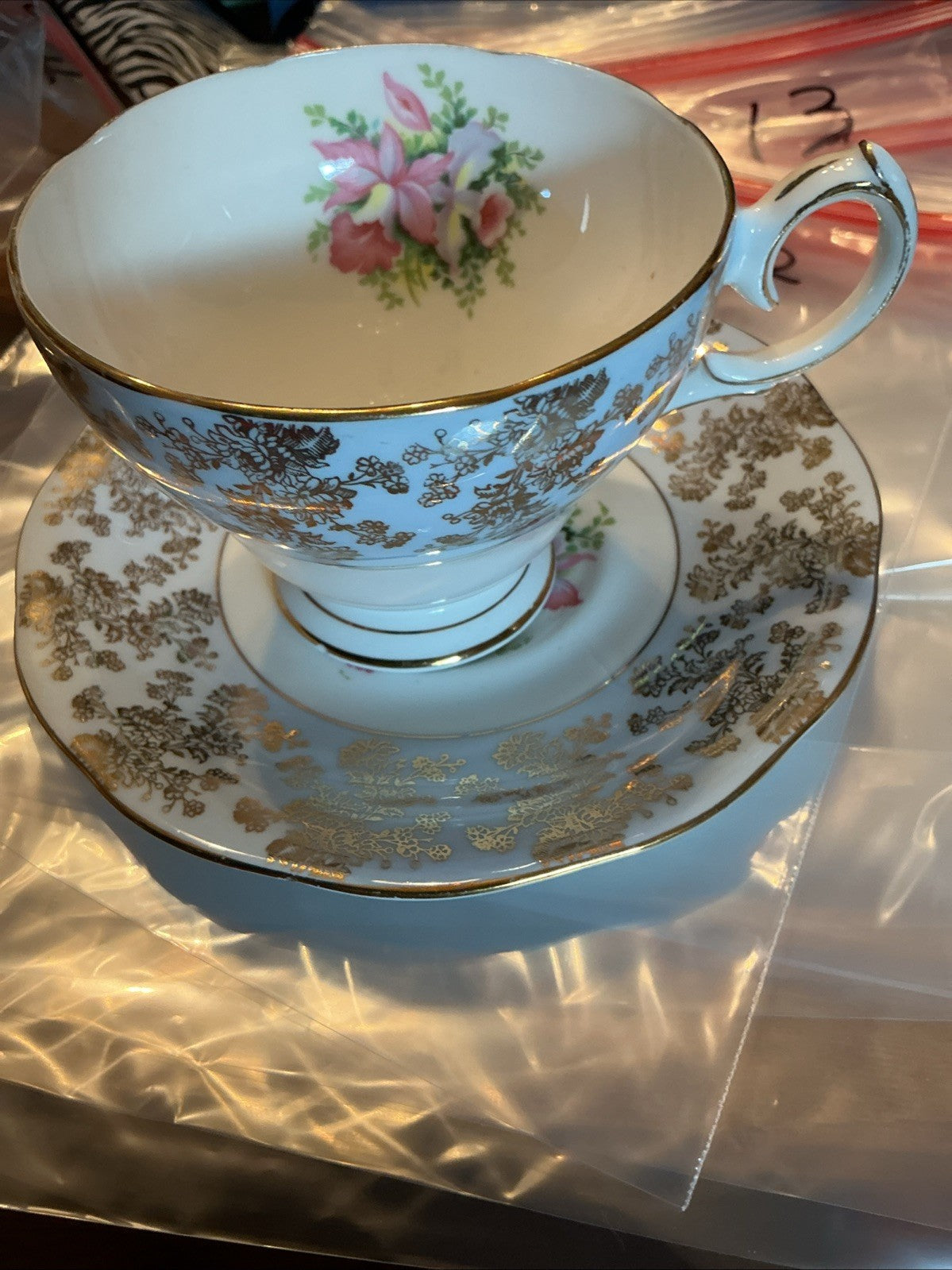 Queen Anne Teacup & Saucer, Robin’s Egg W/ Gold Chintz, Floating Flowers CHN 041