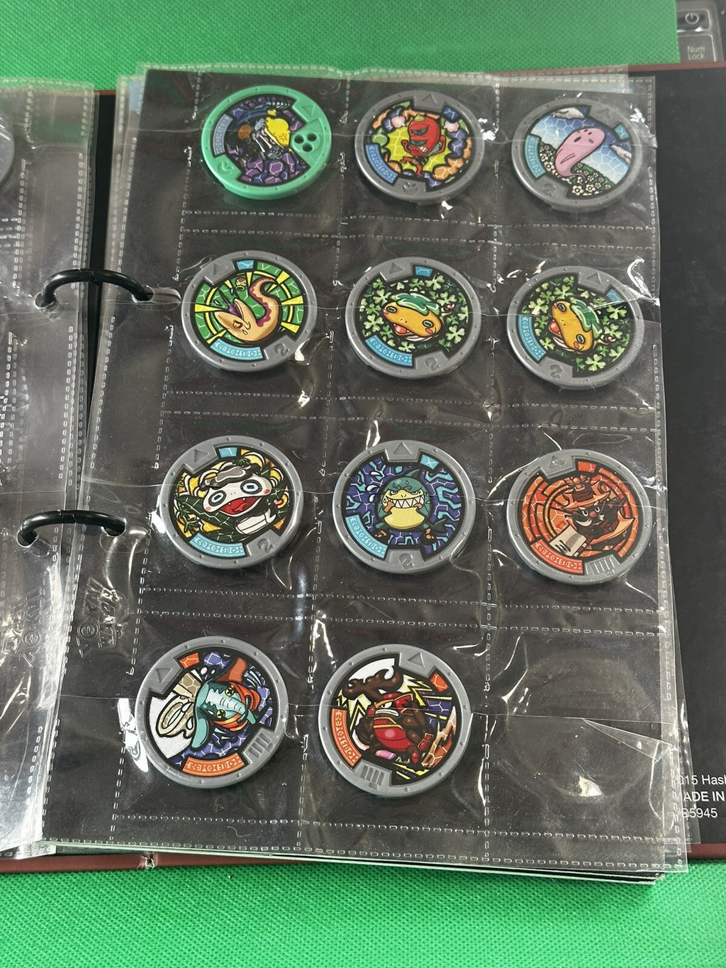 Yo-KAI Watch Hasbro Lot of (53) Medals with Yokai Binder Pages Series 2015 BIN 92