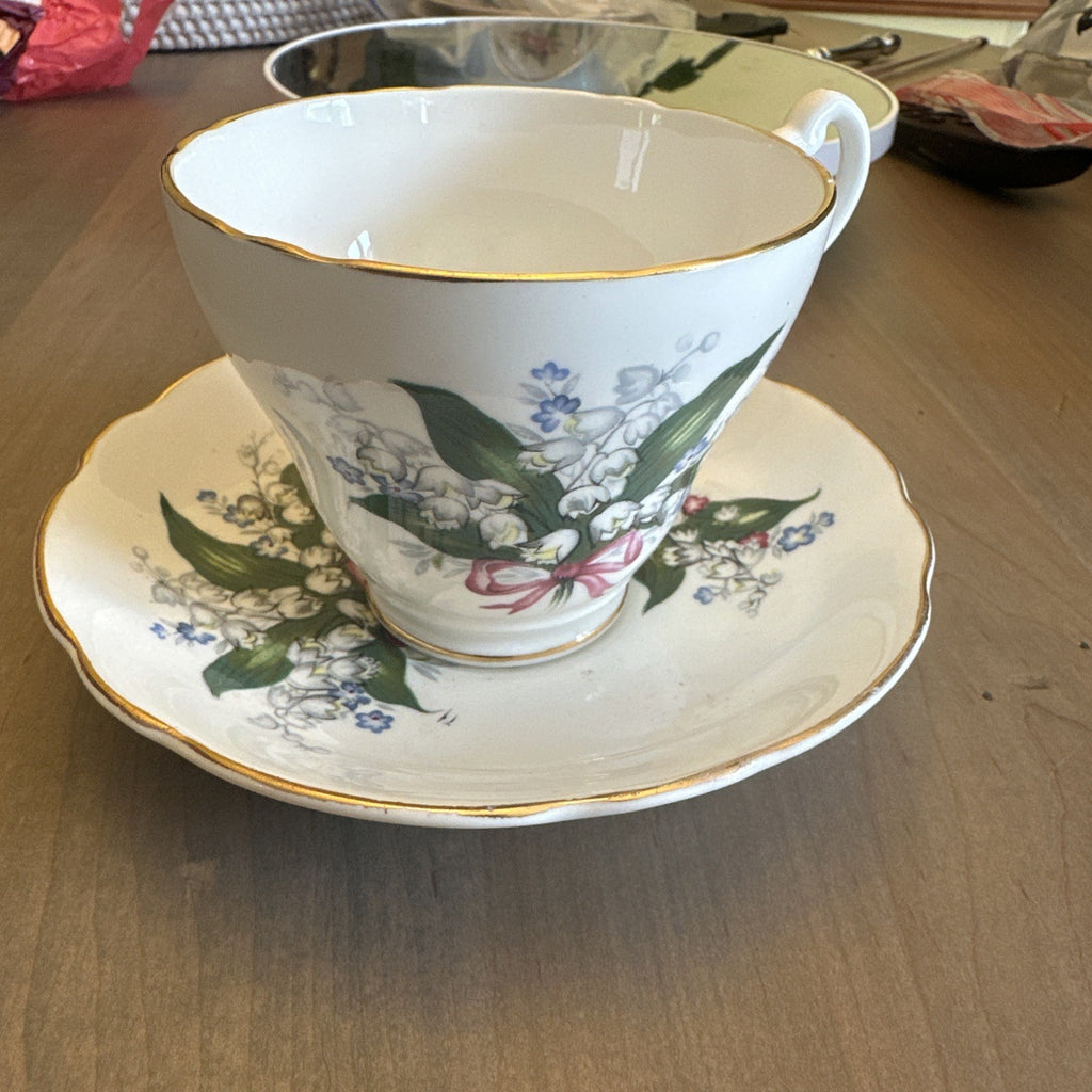 Royal Ascot China Cup & Saucer White w/ Green Leaves & Lillies Gold Trim. CHN 500